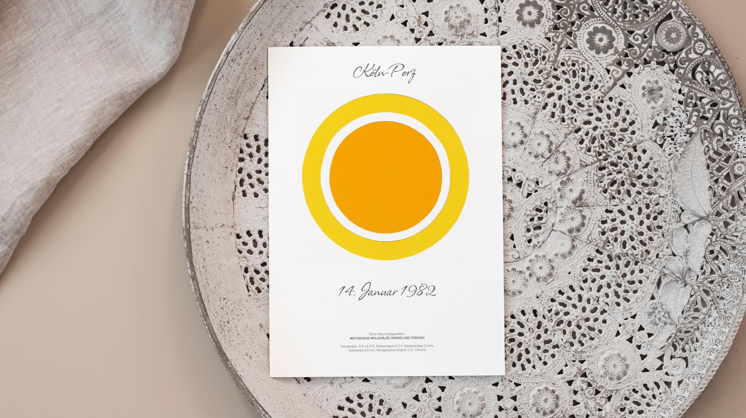 Product mood shot of a card with a collaged sun